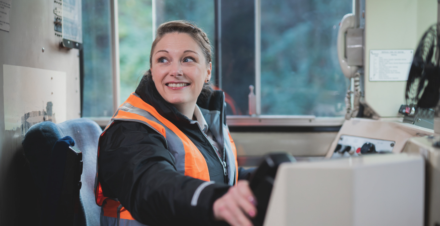 TfW driver in the cab of a train
