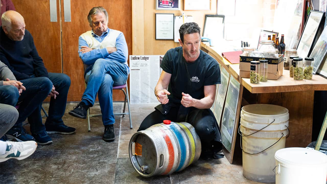 A man holding a keg